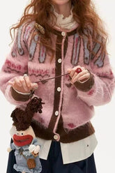 Rosa Fair-Isle-Strickjacke im Retro-Stil, lässig und weich.