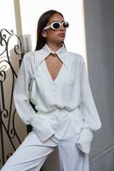 Elegante, lockere Bluse mit Kragen, langen Ärmeln.