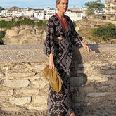 Besticktes Boho-Kleid mit tiefem V-Ausschnitt, rückenfreiem Design und langen Ärmeln, langen Ärmeln