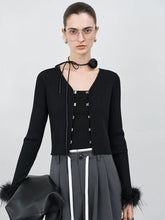 Elegante Strickjacke mit Straußenärmeln