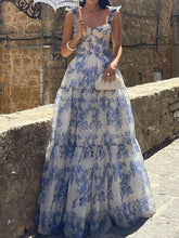 Rückenfreies, tailliertes, ausgestelltes Maxikleid mit Blumenmuster