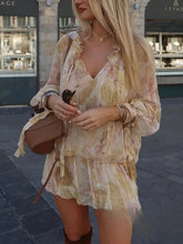 Lila Spaghetti-Kleid mit Blumenmuster