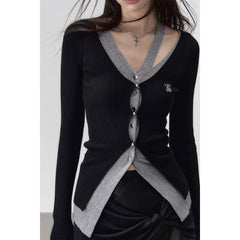 Elegante, lange schwarze Strickjacke mit Lochmuster