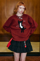 Strickpullover mit tanzender Katze