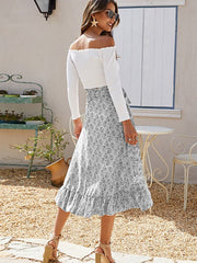 asymmetrischer Rock mit kleinem Blumenmuster und seitlichem Bindeband 