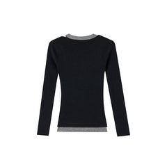 Elegante, lange schwarze Strickjacke mit Lochmuster