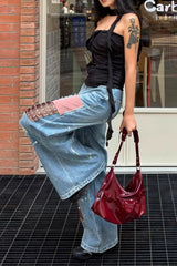 Vintage Jeans mit Farbspritzern und Rissen