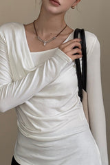 Elegante, asymmetrische, schlanke Basisschicht mit lässigem Kragen