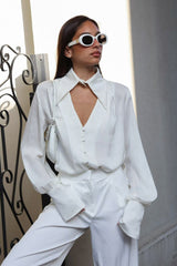 Elegante, lockere Bluse mit Kragen, langen Ärmeln.