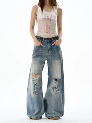 Schwere, kniebelastete, ausgefranste, weite blaue Jeans