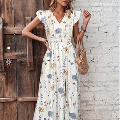 Bedrucktes Kleid mit V-Ausschnitt, hoher Taille und Schlitz bis zum Ohr