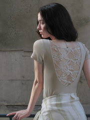 Bluse mit transparentem, besticktem Rückenteil