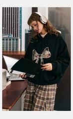 Oversize-Kapuzenpullover mit Spitzenschleife