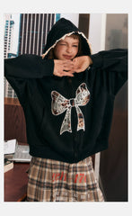 Oversize-Kapuzenpullover mit Spitzenschleife