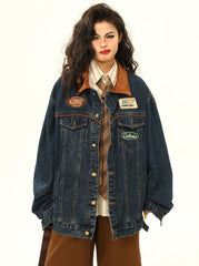 Jeansjacke mit Rennaufnäher und Cordkragen