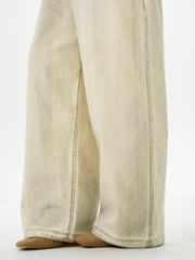 Bestickte cremefarbene Hose mit weitem Bein