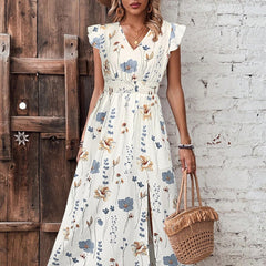 Bedrucktes Kleid mit V-Ausschnitt, hoher Taille und Schlitz bis zum Ohr