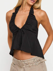 Tief ausgeschnittenes, rückenfreies Camisole mit Neckholder und freiem Bauchnabel