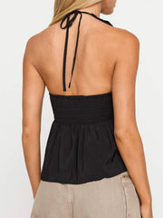 Tief ausgeschnittenes, rückenfreies Camisole mit Neckholder und freiem Bauchnabel