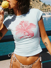 Baby-T-Shirt mit Blumenmuster und kurzen Ärmeln