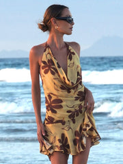Kleid mit schrägen Schultern und Blumenmuster aus Mesh