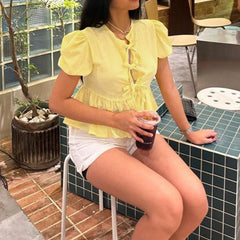Elegante Bluse mit Schößchen und Puffärmeln