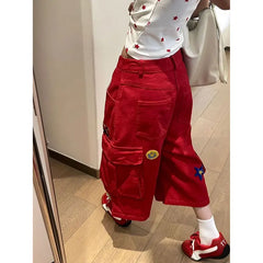 Rote Denimhose mit Herzmuster