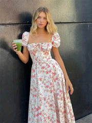 Maxikleid mit Puffärmeln und Schlitz, geblümt