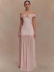 Rosa, figurbetontes Kleid mit Blumenmuster und Raffungen