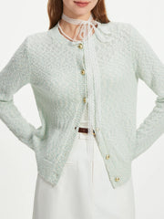 Französische Strickjacke mit langen Ärmeln aus floralem Garn