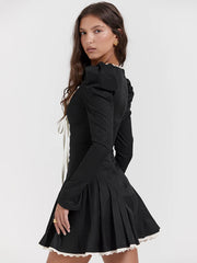 Kleid aus Spitze mit Puffärmeln und Raffungen