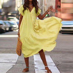 Oversize-Kleid aus Baumwollleinen mit lockerem V-Ausschnitt im Boho-Stil