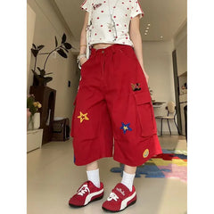 Rote Denimhose mit Herzmuster
