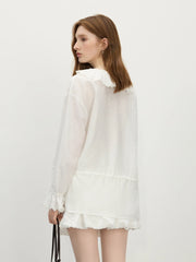 Elegante Bluse mit Rüschenärmeln und botanischem Muster