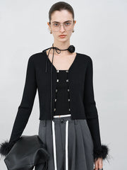 Elegante Strickjacke mit Straußenärmeln