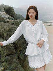 Elegante Bluse mit Rüschenärmeln und botanischem Muster