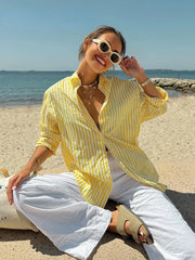 Elegante, gelb gestreifte, locker sitzende Bluse