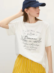 T-Shirt mit geripptem Halsausschnitt und Blumenmuster sowie Buchstabenapplikationen