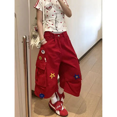 Rote Denimhose mit Herzmuster