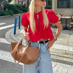 Elegante Bluse mit Schößchen und Puffärmeln