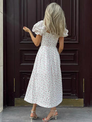 Schulterfreies, bedrucktes, schmal geschnittenes Maxikleid mit Schlitz