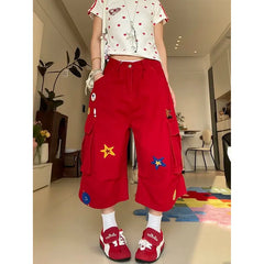 Rote Denimhose mit Herzmuster
