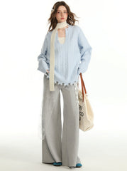 Herbstliches Set aus einfarbigem Pullover und Unterweste