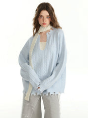 Herbstliches Set aus einfarbigem Pullover und Unterweste