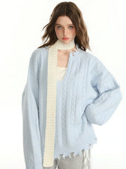 Herbstliches Set aus einfarbigem Pullover und Unterweste