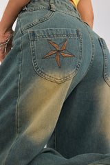 Bestickte, gewaschene Retro-Jeans mit weitem Bein