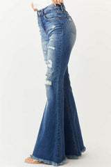 Schmal geschnittene, dehnbare Jeans mit mittelhohem Bund, Fransen und Vintage-Schlaghose