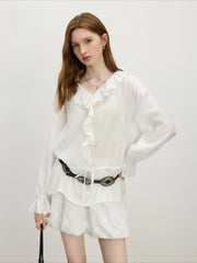 Elegante Bluse mit Rüschenärmeln und botanischem Muster