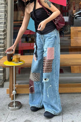 Vintage Jeans mit Farbspritzern und Rissen