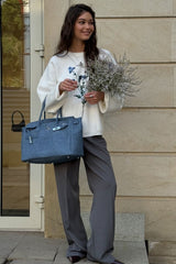 Bestickter, lässiger Strickpullover mit langen Ärmeln